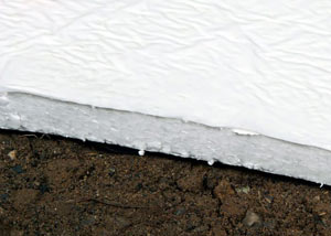 Insulation installed on a crawl space floor in Roy