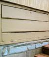 an old-fashioned crawl space door in Pleasant Grove about to be replaced