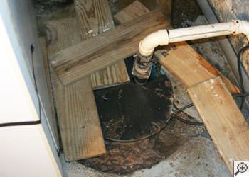 An ugly, clogged sump pump system in Logan, Utah, Idaho, and Wyoming
