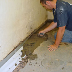 Testing a French drain system in a West Jordan home.