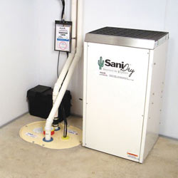Sump pump system, dehumidifier, and basement wall panels installed during a sump pump installation in Roy