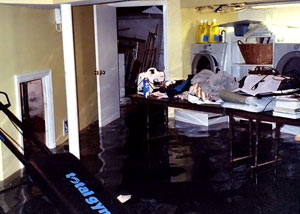 A laundry room flood in Roy, with several feet of water flooded in.